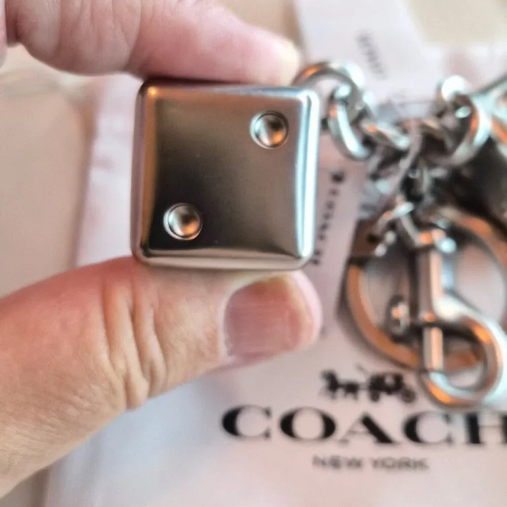 Coach Dice Bag Charm #CZ128 purchase comes with Coach dust bag